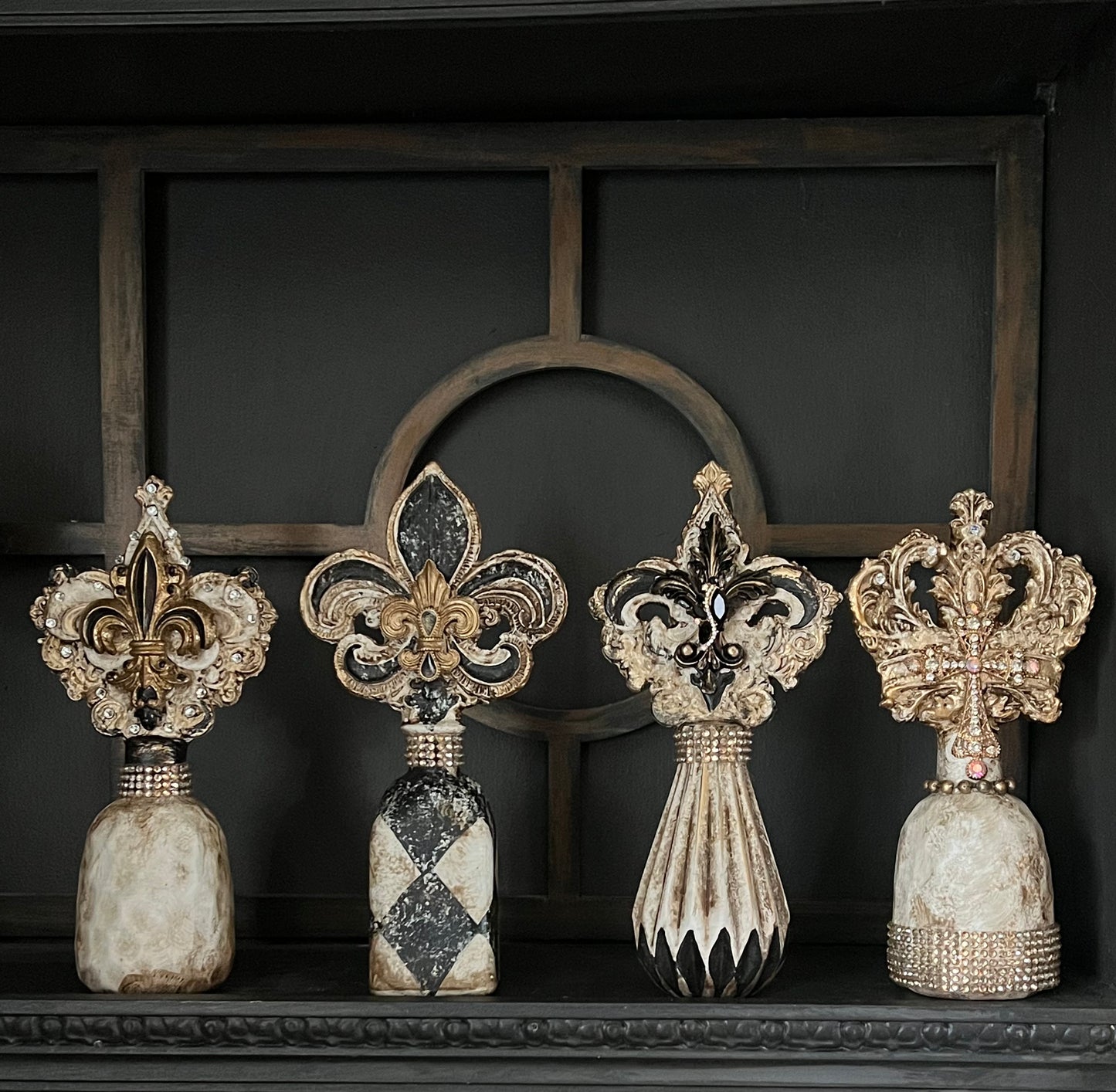 A Fleur de Lis and Crown Reliquary Bottles