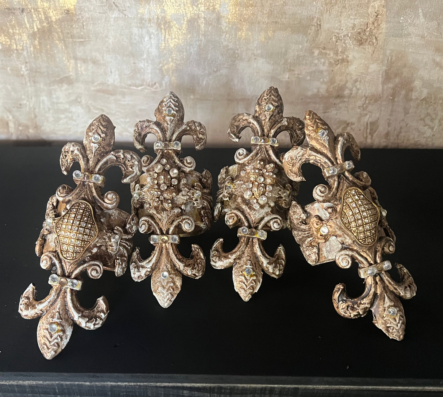 Gilded Fleur de Lis Napkin Ring Set